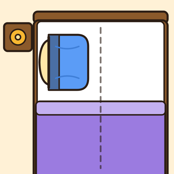 Toward the edge of the bed